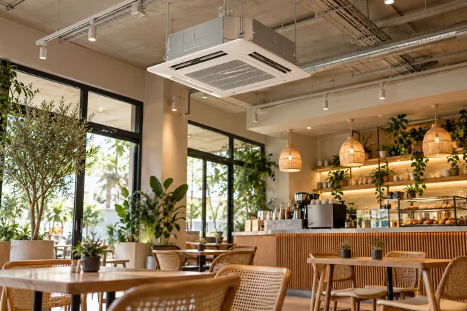 Climatització de cafeteria · Imatge il·lustrativa d'aire condicionat